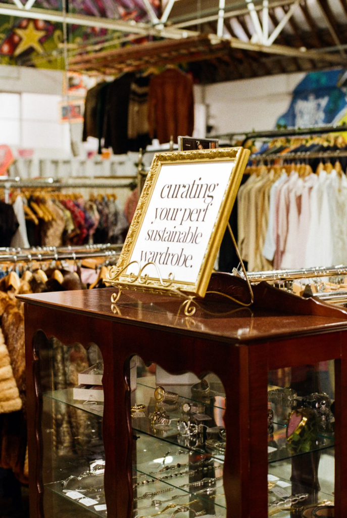 Thrifty Gal jewellery cabinet and sustainable wardrobe sign inside My Dead Grandpa vintage marketplace.
