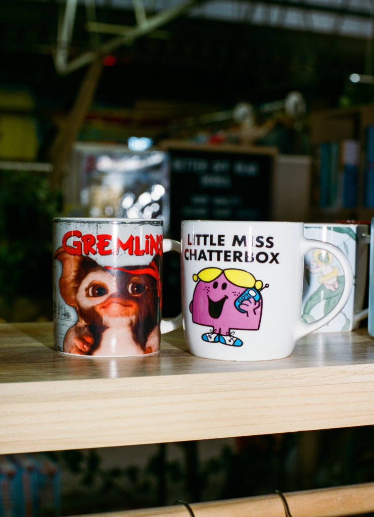 Gremlins and Little Miss mugs displayed with Better Off Read books in Adelaide