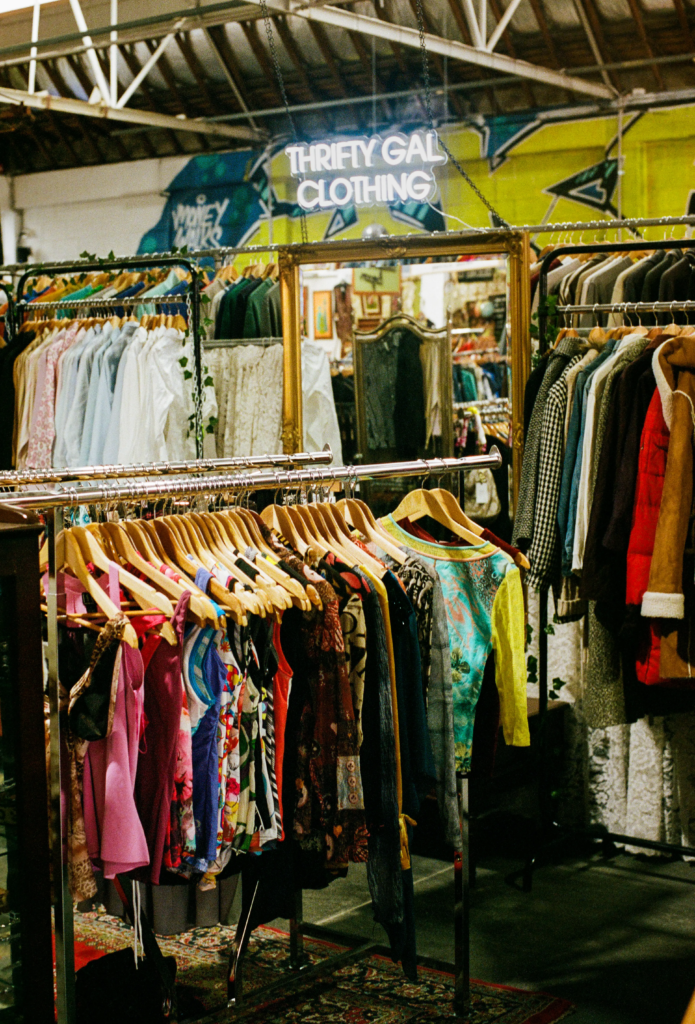 Thrifty Gal clothing racks with Y2K tops, dresses and preloved fashion inside My Dead Grandpa Adelaide.