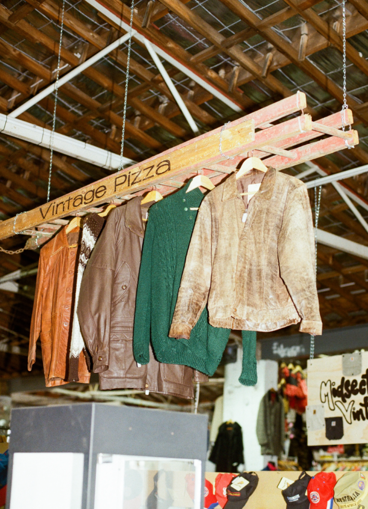 Vintage Pizza display with leather jackets and knitwear hanging inside My Dead Grandpa Adelaide