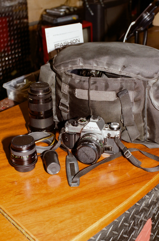 Canon film camera with lenses and camera bag from Old Skool Optics Adelaide.