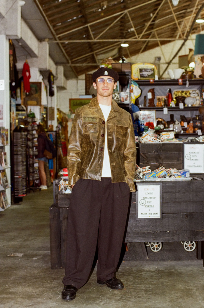 Model wearing a vintage leather jacket and beret at From Here to Eternity inside My Dead Grandpa Adelaide