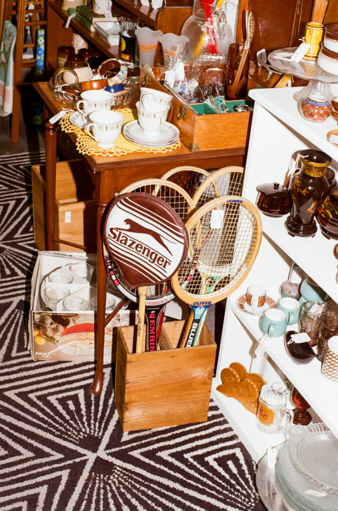 Vintage kitchenware, teacups, glassware and tennis racquets at Collectable Clutter Adelaide.