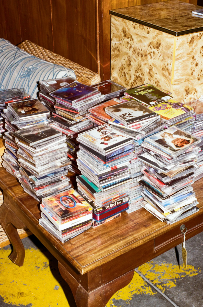 Large stacks of pre-owned CDs ready for sale at Deadbeat Sounds in Adelaide