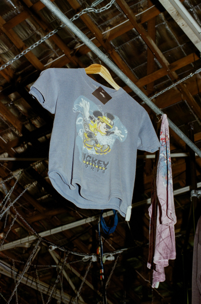 Vintage Mickey Mouse graphic T-shirt hanging in the Juno clothing space at My Dead Grandpa