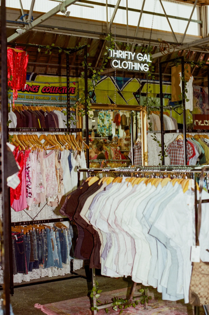 Thrifty Gal clothing stall with Y2K tops, preloved shirts and denim inside My Dead Grandpa Adelaide.