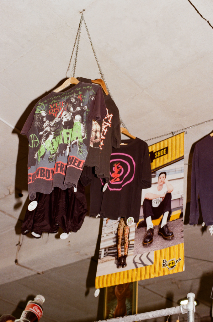 Hanging vintage graphic band tees and streetwear pieces in the Scrapdogs space at My Dead Grandpa Adelaide